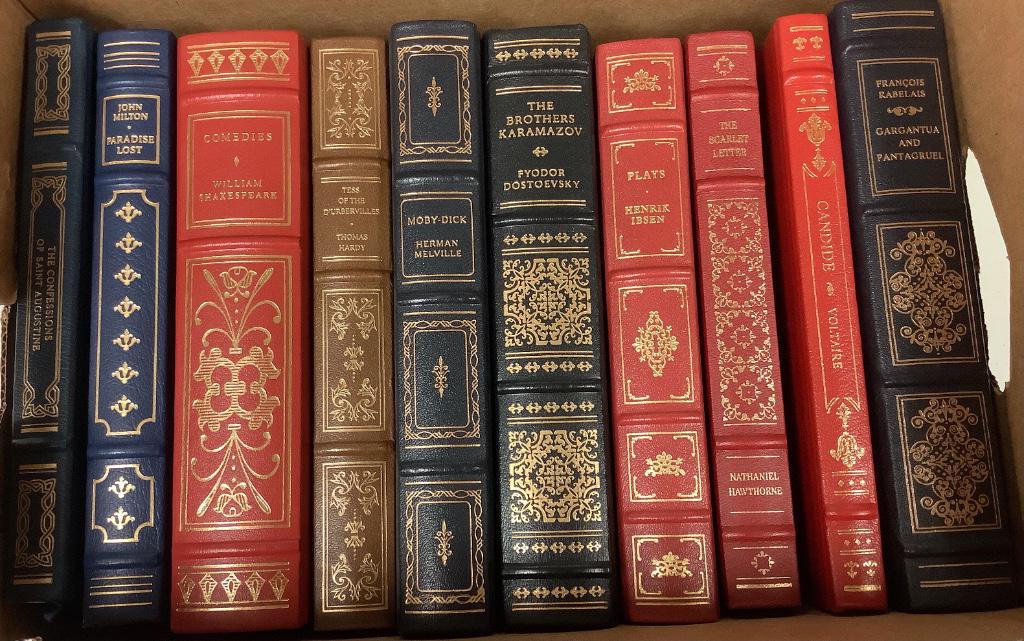 Lot of ten leather bound books including the titles of: Lot of ten leather bound books including the titles of Moby Dick, Paradise Lost, The Scarlet Letter and others.