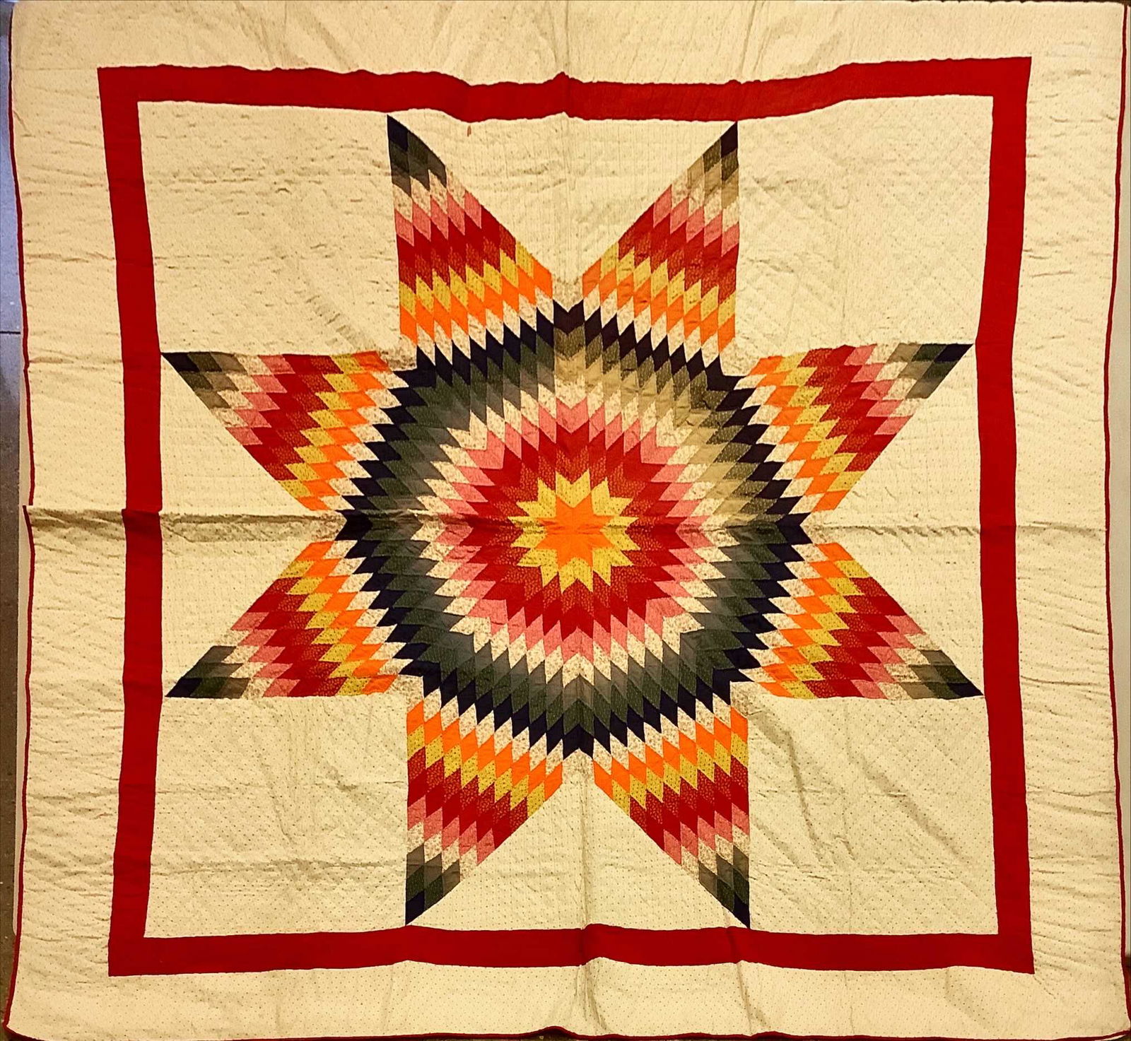 8 pointed star quilt. Few stains noticeable. (1 of 3)
