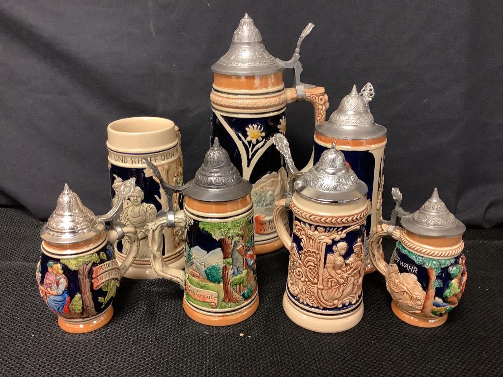 Lot of 7 German steins, various sizes. (1 of 3)