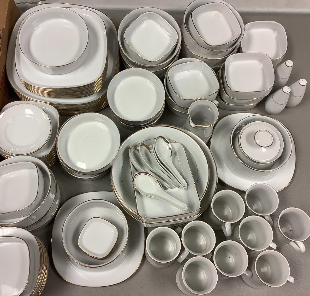 Brand HP 85 pieces of white with gold dinnerware and 8: Brand HP 85 pieces of white with gold dinnerware and 8 spoons.