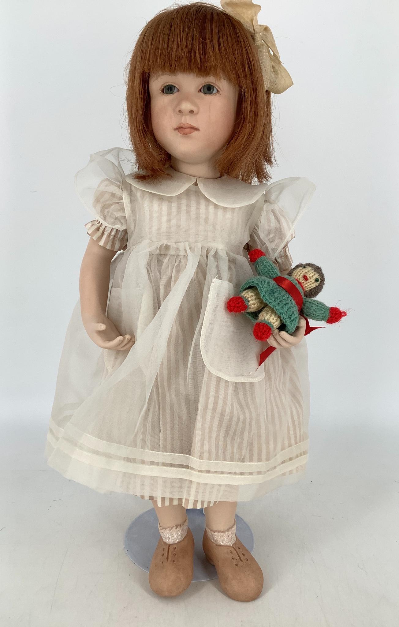 All porcelain artist doll by Ruth Treffeisen. 16 3/4" (1 of 2)