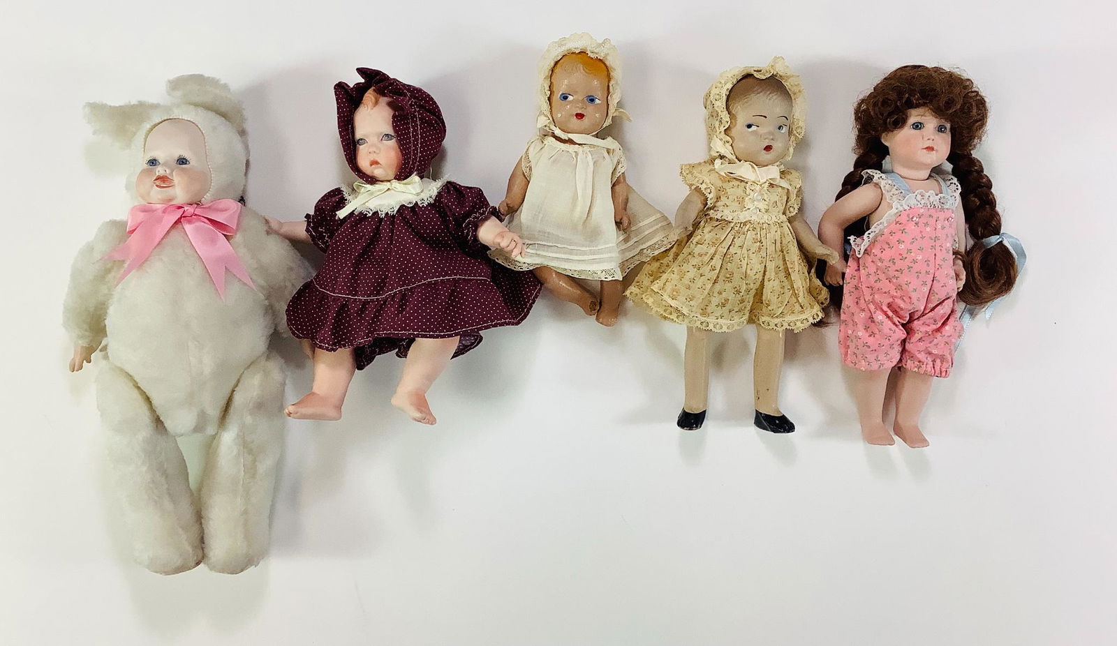 Lot (5) dolls including vinyl, bisque and composition. (1 of 1)