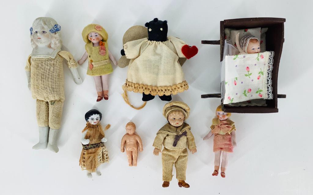 Lot (8) bisque, china, cloth and celluloid dolls (one (1 of 1)