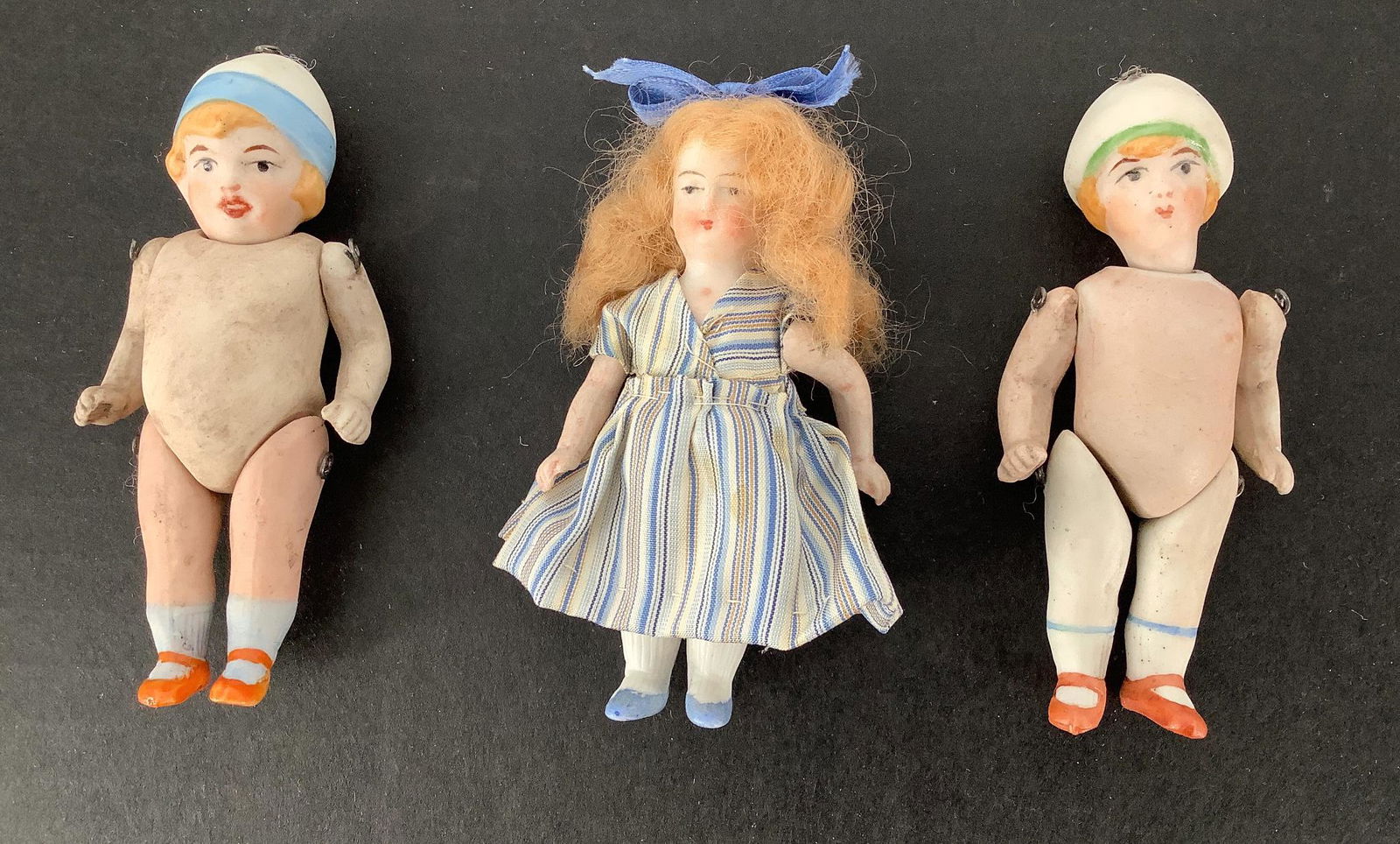 (3) small All-bisque girls. Includes two 3 3/4" dolls (1 of 2)