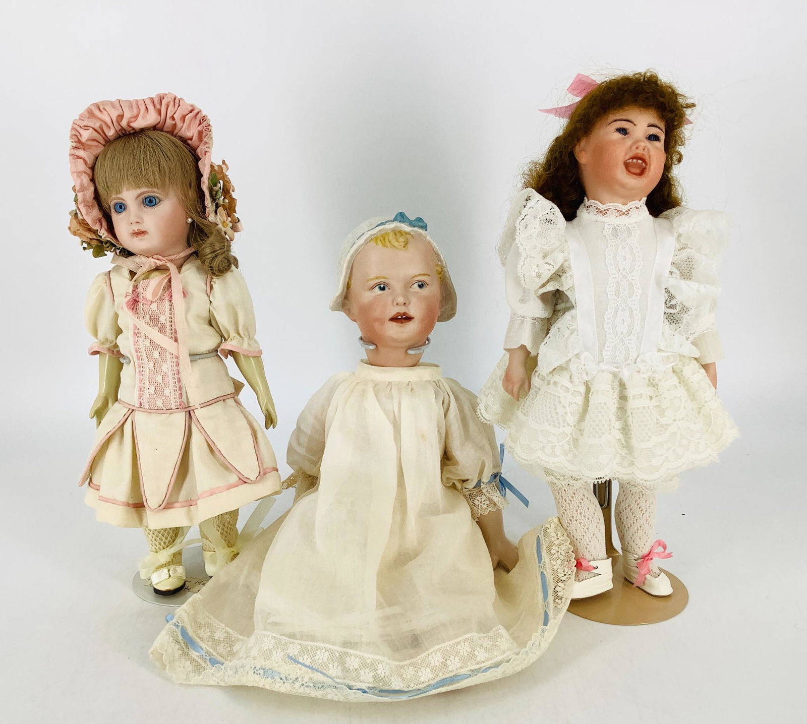 Lot (3) bisque dolls. (1 of 1)