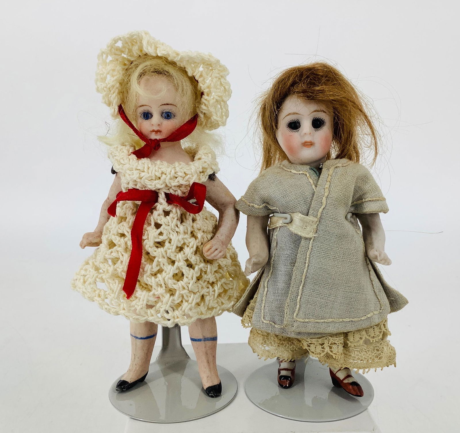 (2) small doll house size all-bisque dolls. Includes 4 (1 of 1)