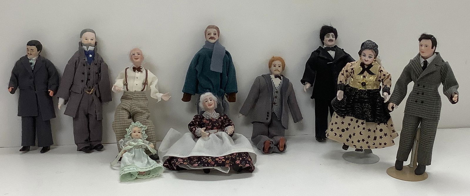 Lot of 10 small dolls depicting Victorian costumes from (1 of 2)