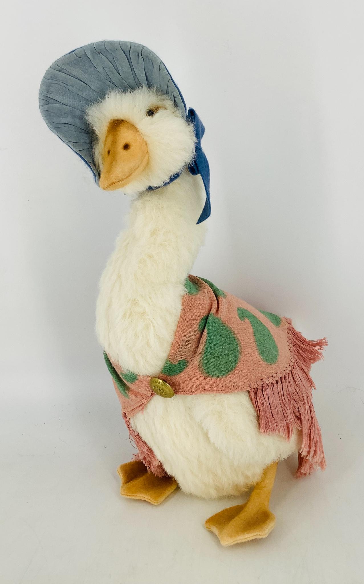 Alpaca plush and wool felt "Jemima Puddle-Duck" by R.: Alpaca plush and wool felt "Jemima Puddle-Duck" by R. John Wright. Jemima measures 15" tall and has a jointed head and moveable wings. Dressed in her custom printed cotton shawl and organdy bonnet she