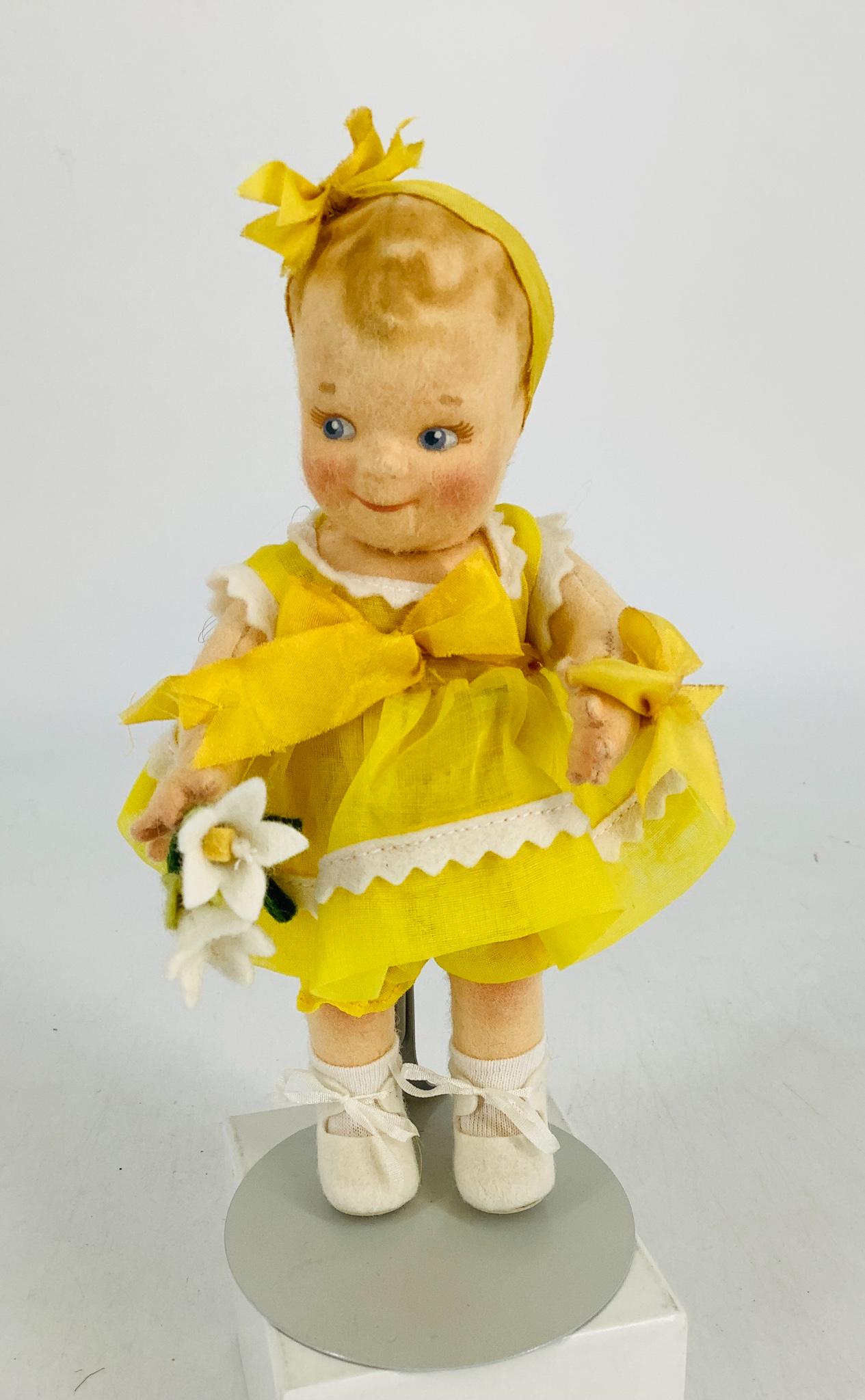 All felt "Sunshine Scootles" by R. John Wright. 7" doll: All felt "Sunshine Scootles" by R. John Wright. 7" doll with molded and painted hair and facial features, on five-piece body with disk jointed arms and legs. In overall excellent condition. No box or