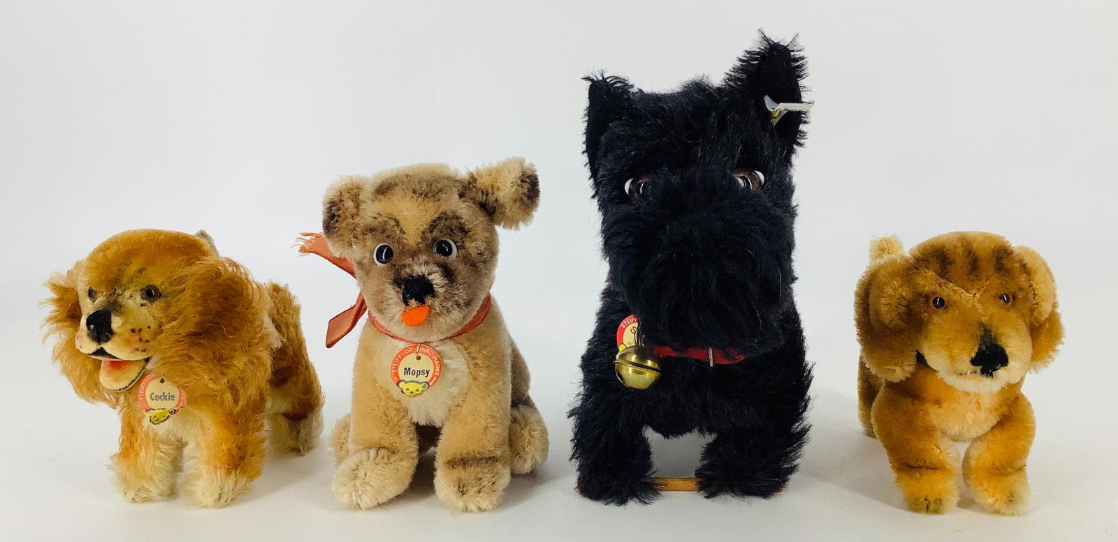 Lot (4) Steiff mohair dogs. Includes 4" Bazi Dachshund (1 of 1)