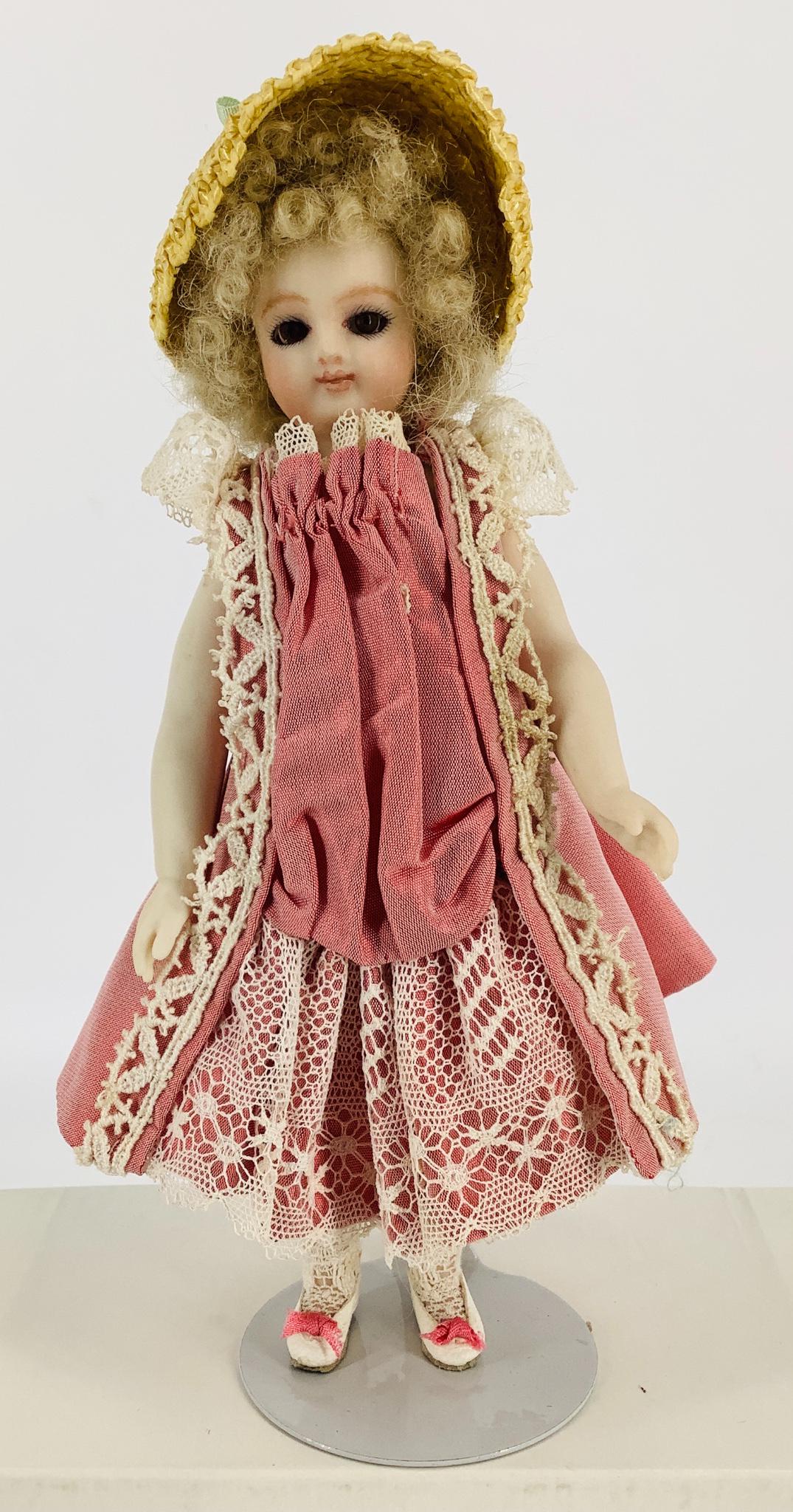 Reproduction all-bisque mignonnette. 5 1/2" socket head (1 of 2)