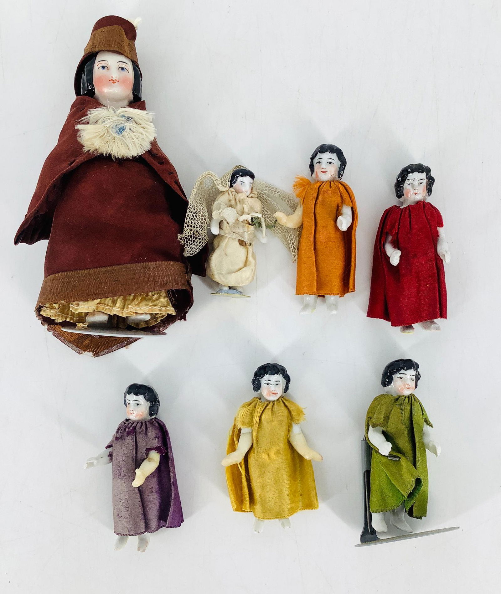 Lot of seven small China dolls ranging from 2 1/4 in. (1 of 1)