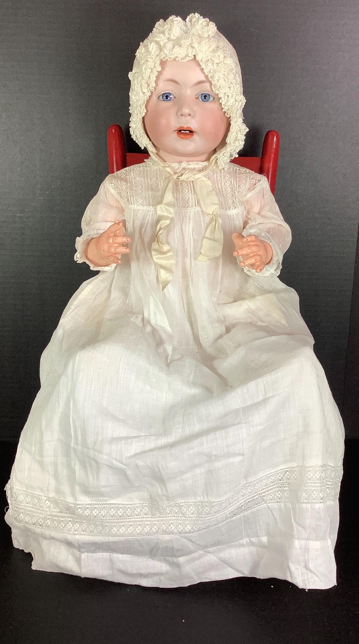 Swaine & Co. 232 bisque socket head character baby: Swaine & Co. 232 bisque socket head character baby "Lori". Solid dome with molded and painted hair, glass sleep eyes, open mouth with two lower teeth, on five-piece composition bent limb baby body. Bi