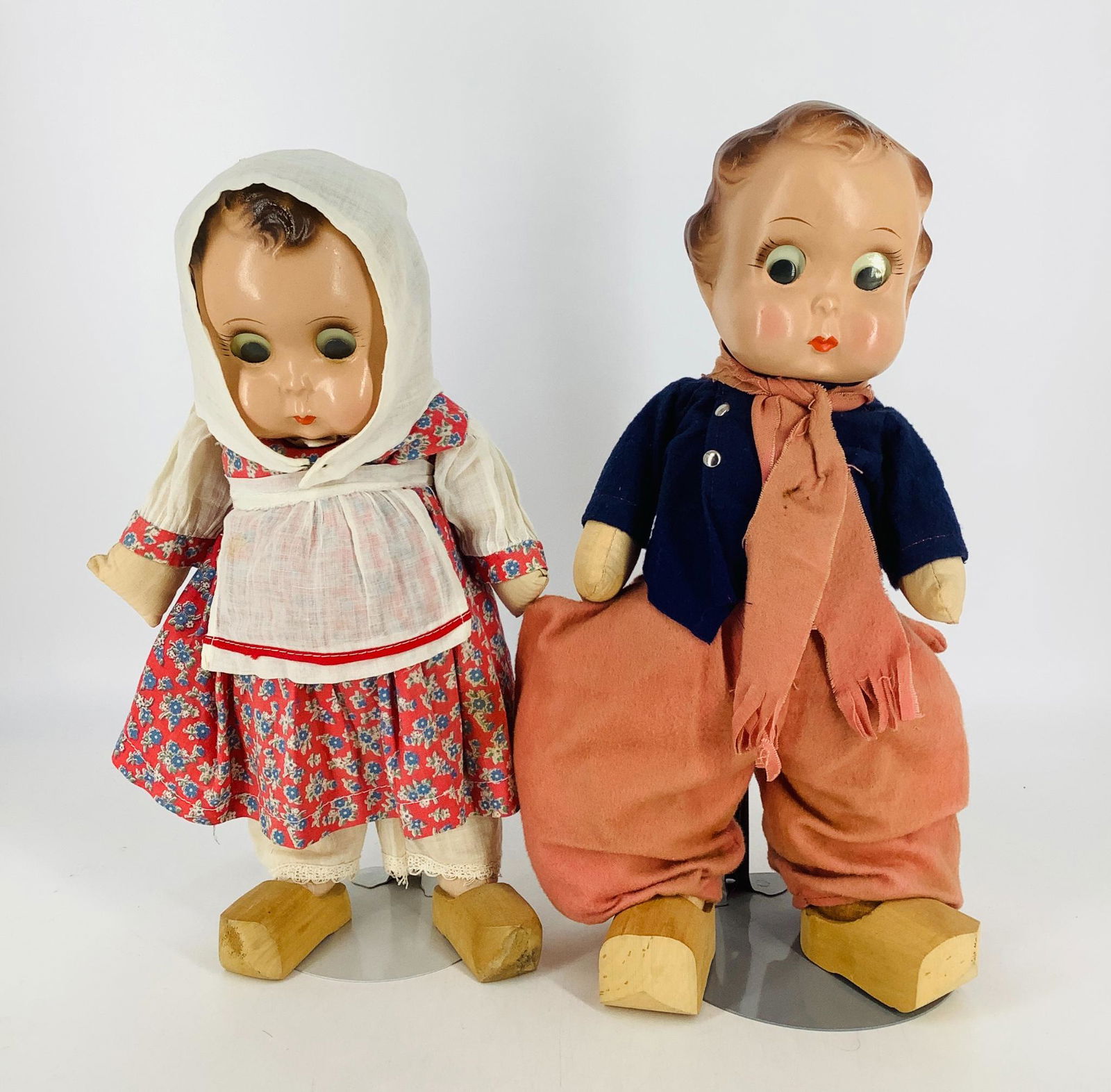 Pair vintage composition flange head googly dolls. (1 of 3)