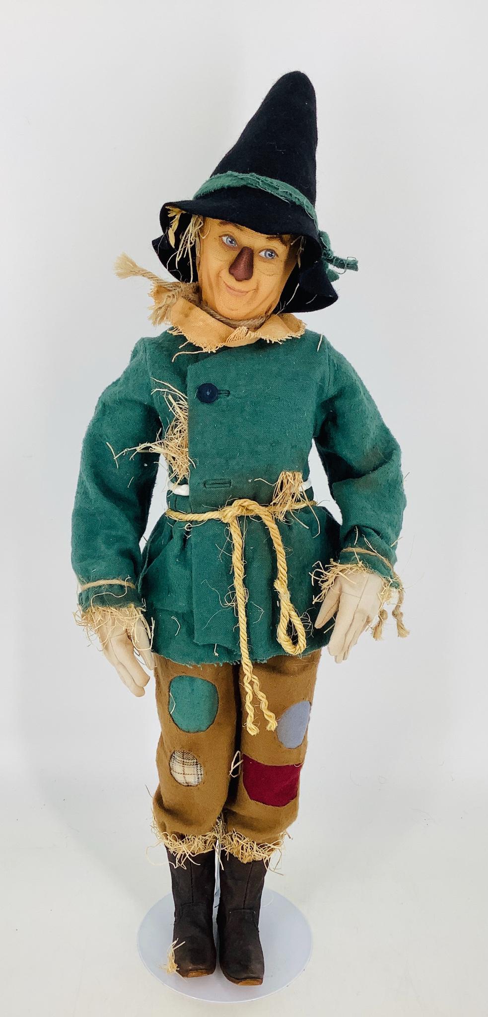 "Scarecrow" by R. John Wright. From the Wizard of Oz: "Scarecrow" by R. John Wright. From the Wizard of Oz collection, the Scarecrow is 18" tall and jointed at the neck, shoulders, elbows, hips and knees with a ball and socket jointing system. His molded