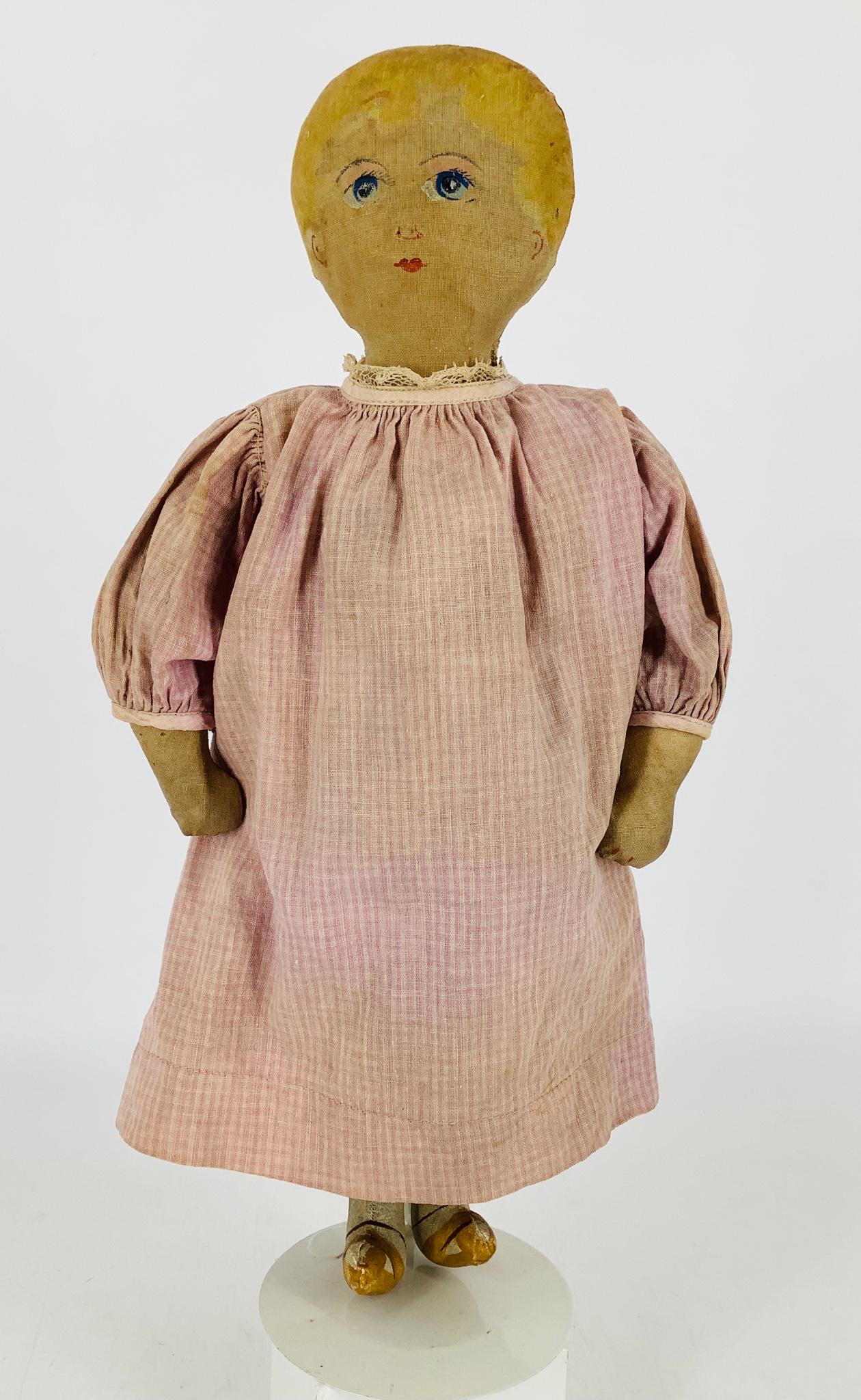 Early cloth doll with painted features. 14 1/2" flat (1 of 2)