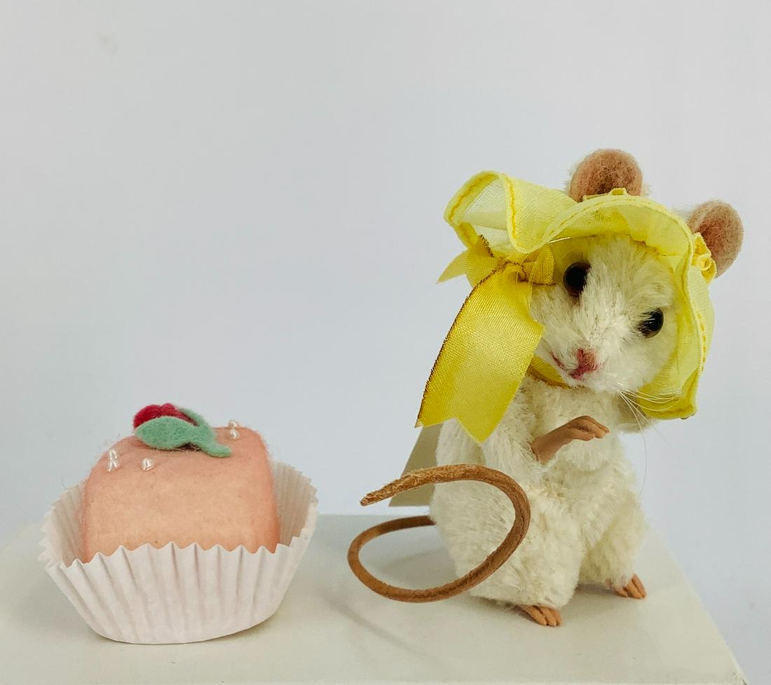 White mohair mouse "Petit Four" by R. John Wright. Made: White mohair mouse "Petit Four" by R. John Wright. Made exclusively for The Toy Shoppe Petit Four is 3" tall with jointed neck and arms, glass eyes, resin hands and feet and leather tail. She wears he