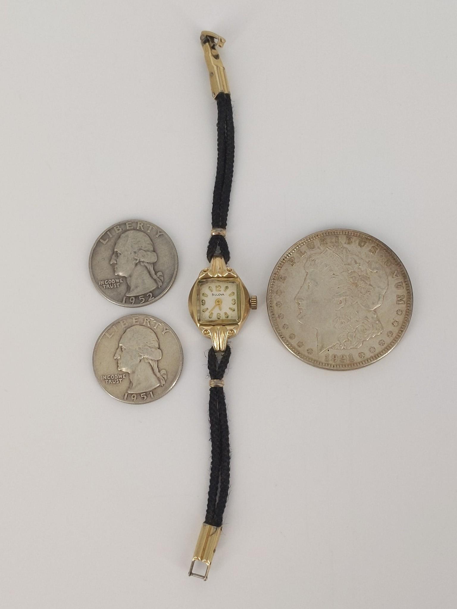 Vintage Ladies Bulova Wrist Watch & U.S. Coins: Vintage Ladies Bulova Wrist Watch & U.S. Coins Yellow gold filled medal bezel with 10kt white gold R.G.P. Replaced backing, white face with gold numeric indicators and hands, 17 jewel adjusted movemen
