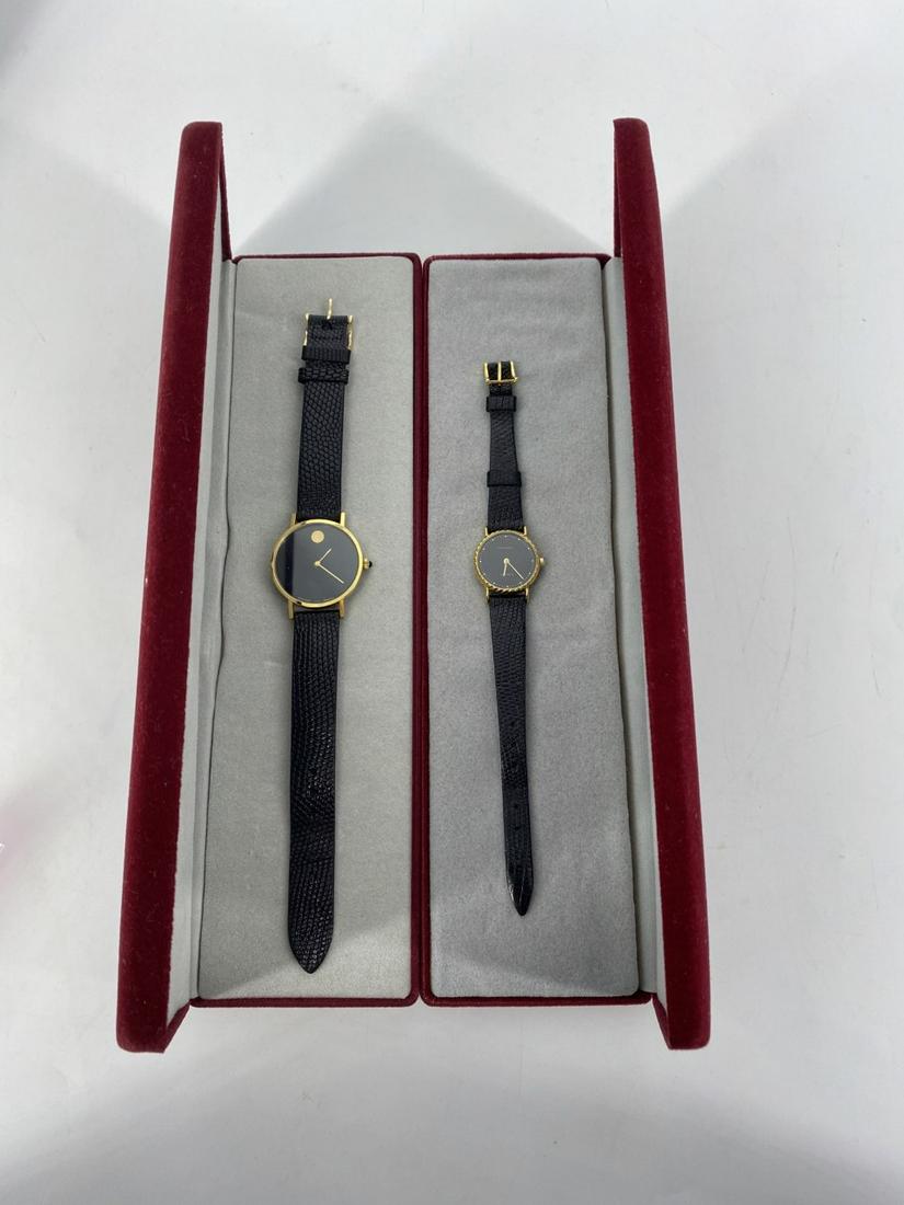 Two Vintage Movado Wrist Watches: Two Vintage Movado Wrist Watches Stainless steel case, dial measuring 22.7 mm in diameter featuring black face with gold-toned dot indicators and straight hands. Bands feature alligator skin pattern a