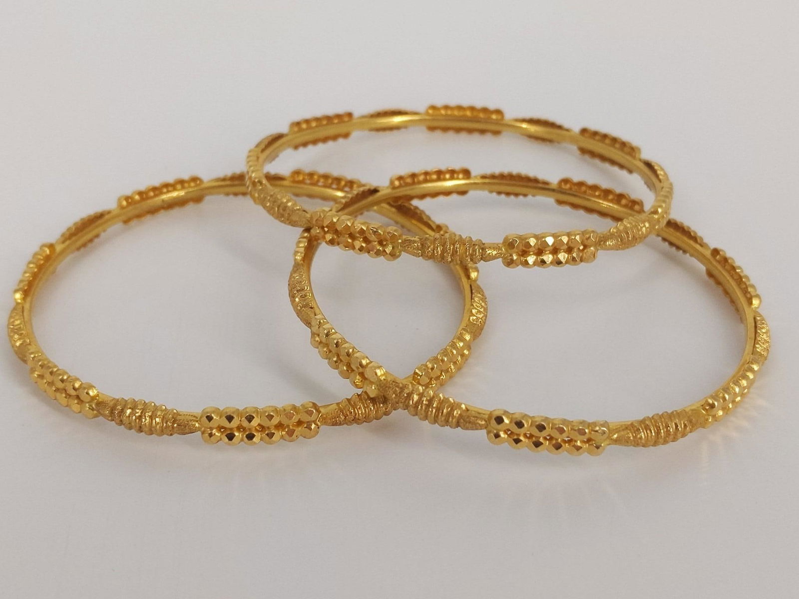 Three High Kart Yellow Gold Bangles (1 of 5)