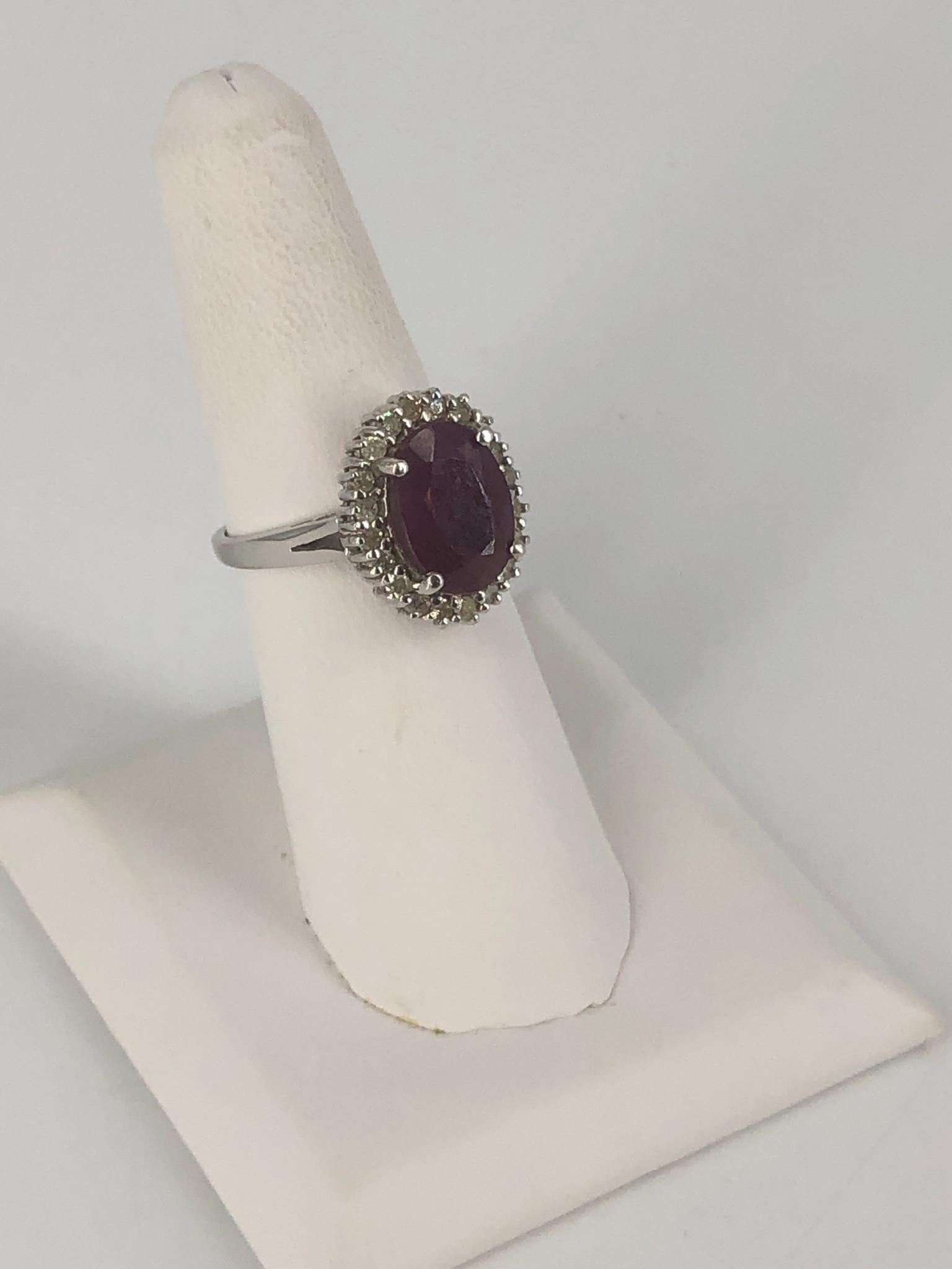 14kt White Gold Ring with Ruby Center and Diamond Halo (1 of 6)