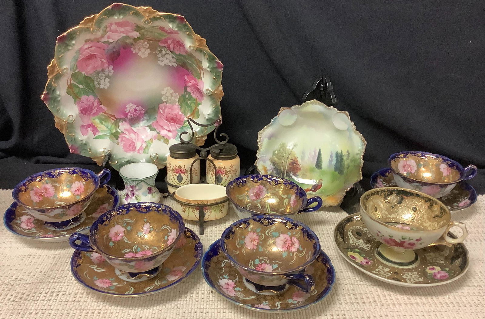 Lot of china including 5 tea cups w/ saucers. (1 of 1)