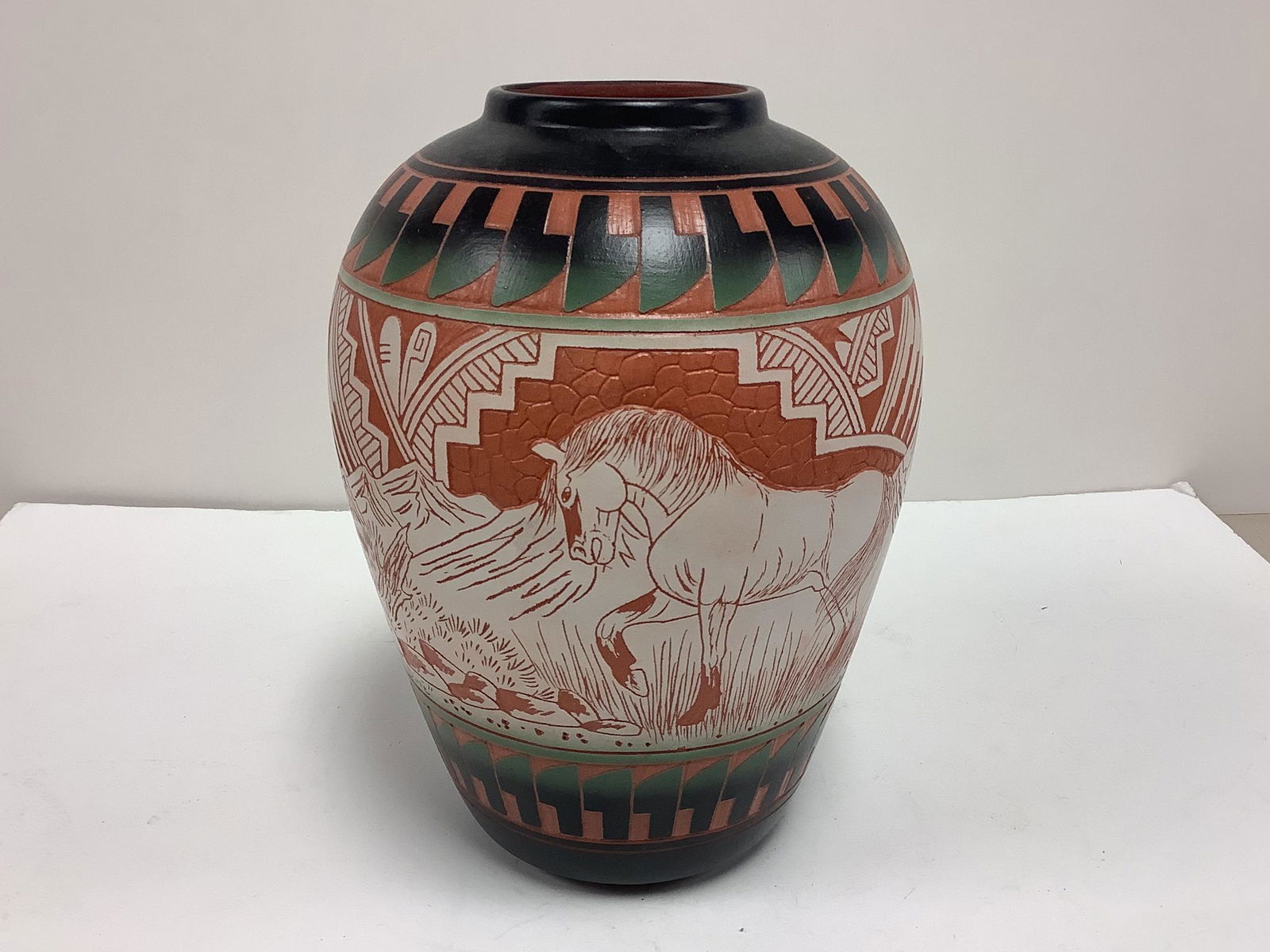 Hand painted piece of Navajo pottery. (1 of 2)