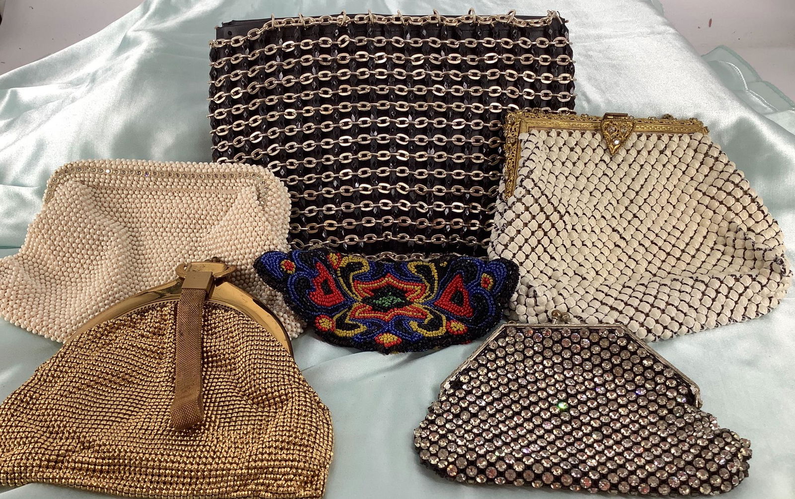Lot of six purses including a zippered colorful small (1 of 2)
