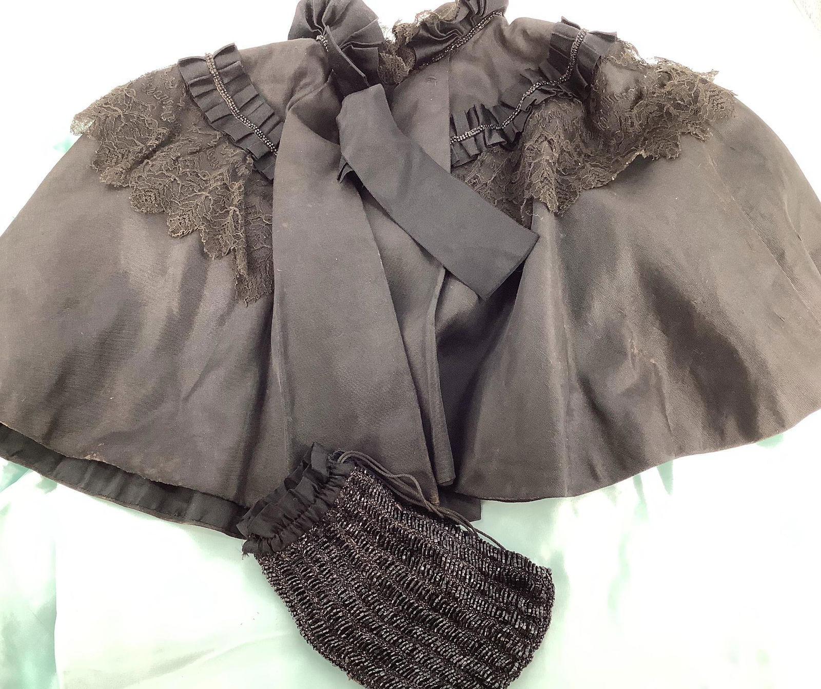 Lot of a Victorian small black lined shawl with lace (1 of 2)