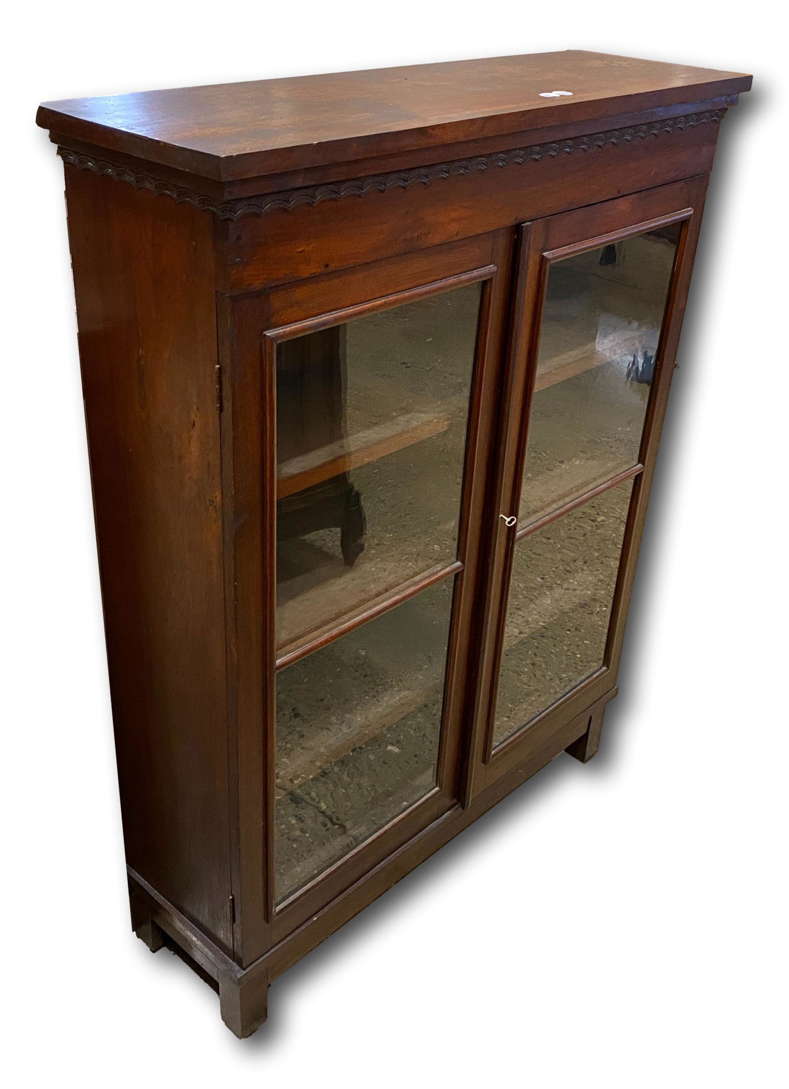 Mahogany two door cabinet on base may have been a (1 of 4)