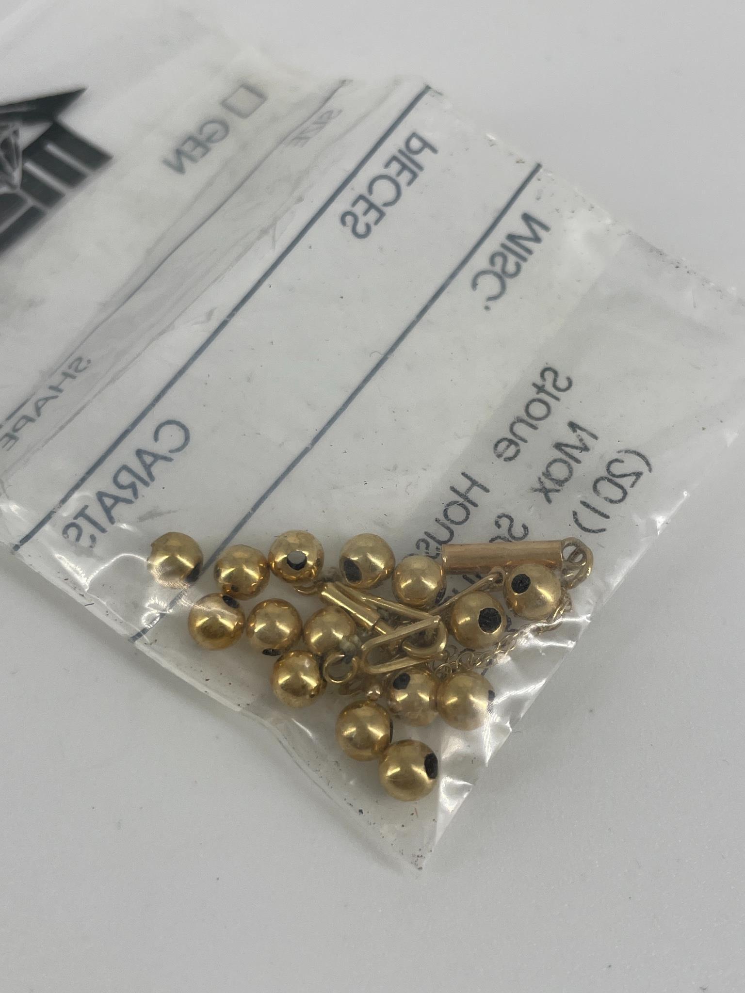 Fifteen Gold Beads and Three Pieces of Scrap Gold (1 of 1)