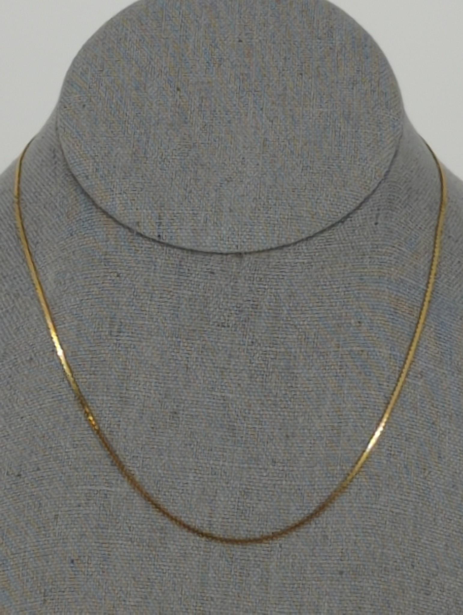 Gold Necklace: Gold Necklace 14kt yellow gold (stamped and tested), 16" choker length snake chain with spring ring clasp closure, 2.2 grams total weight.