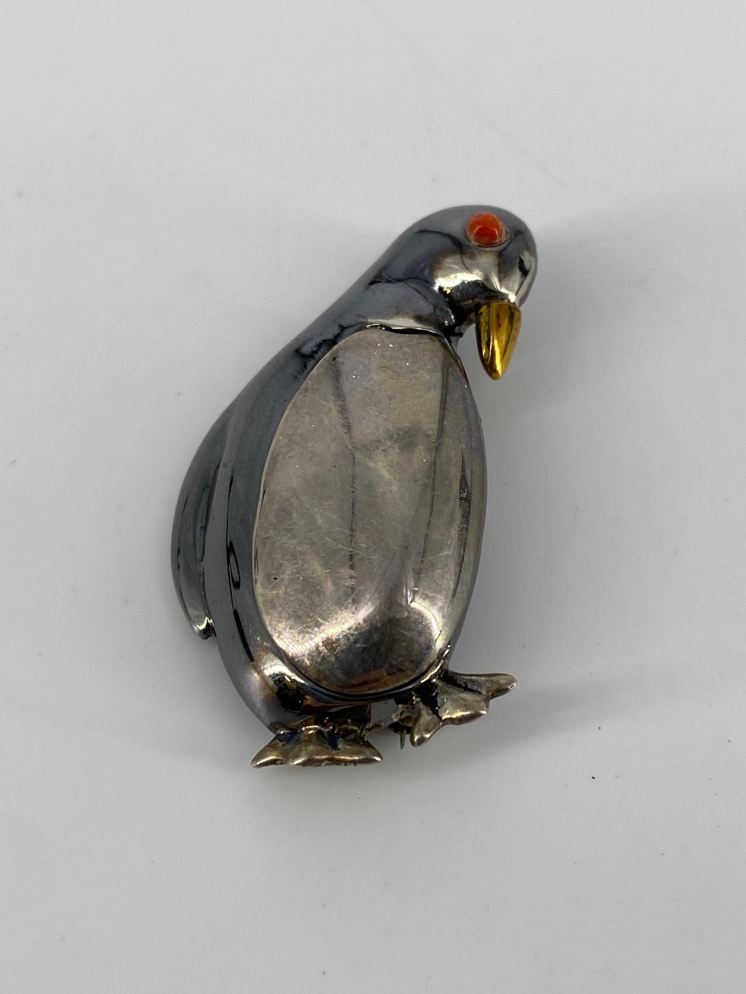 Vintage Sterling Silver Tiffany & Company Penguin Pin: Vintage Sterling Silver Tiffany & Company Penguin Pin 1.65" x 1", featuring a gold tone beak, a silver tone belly and dark grey body, stamped, tested & signed (0.29 troy oz tw)