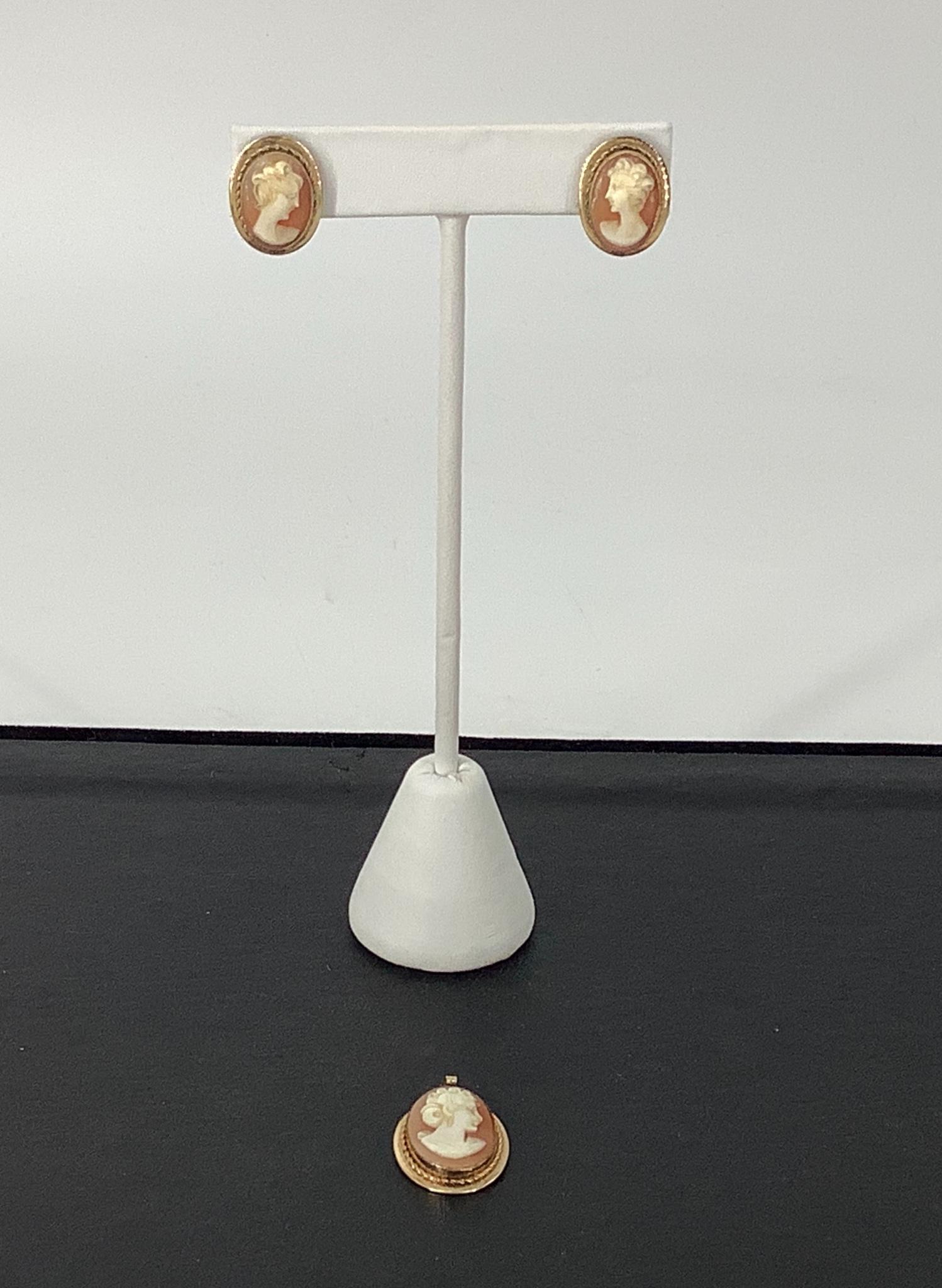 Vintage Cameo Jewelry Set: Vintage Cameo Jewelry Set New old stock set including the original box and tag hand carved shell cameos including a pendant and a pair of post back earrings (pendant approx. 1" in length, 18kt gold fi