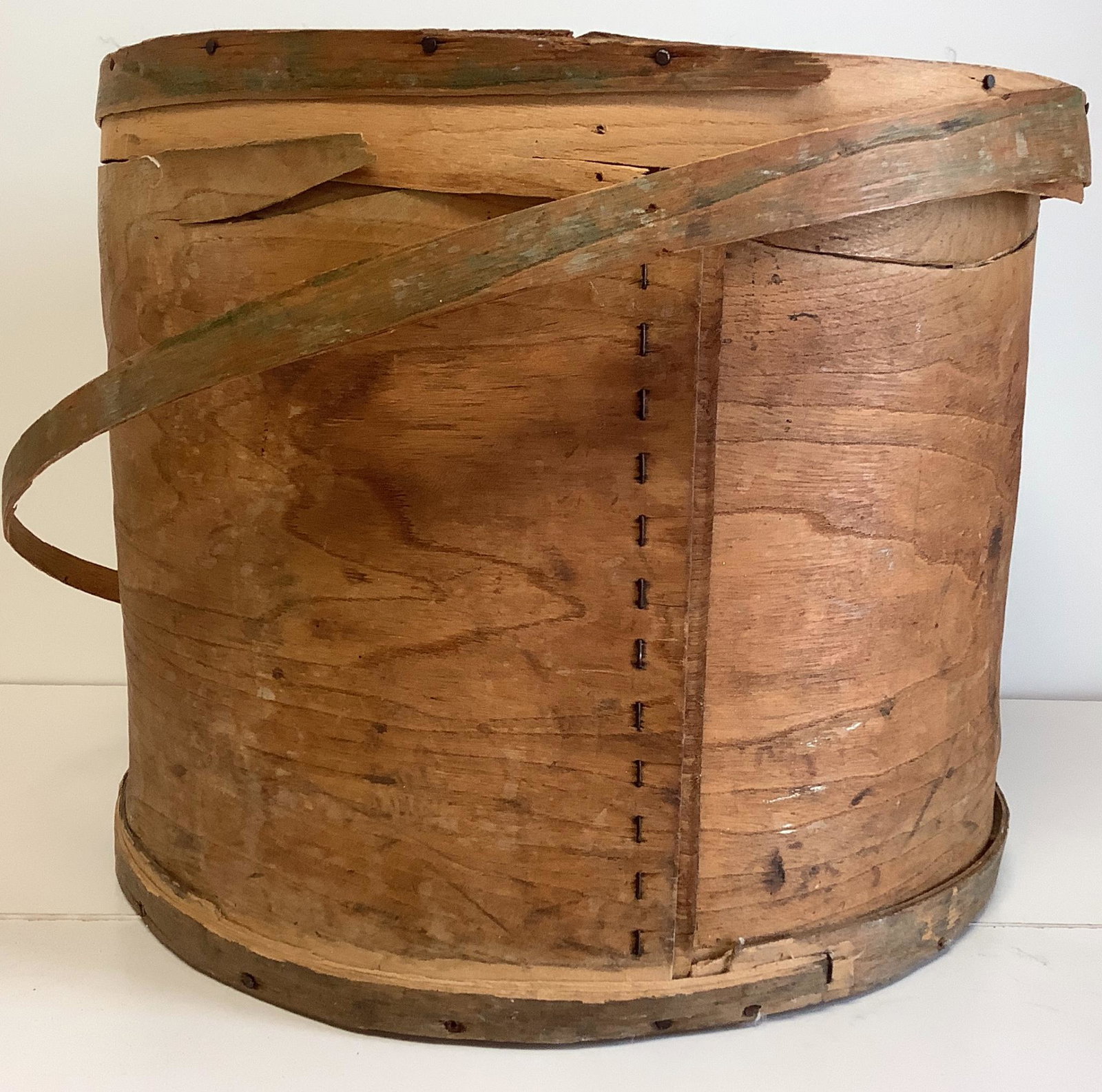 Vintage round wooden box with lid,13.5"h. Trim around: Vintage round wooden box with lid,13.5"h. Trim around lid is loose.