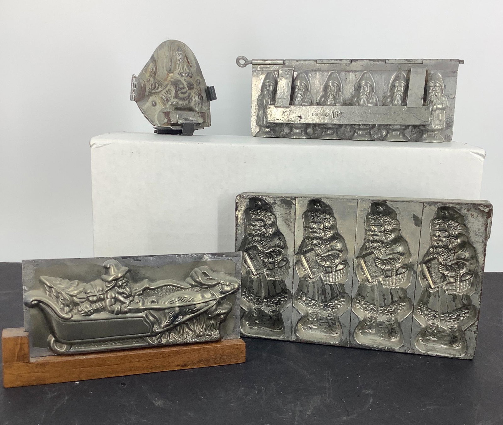 Lot of 4 old metal chocolatier Santa candy molds, one (1 of 2)