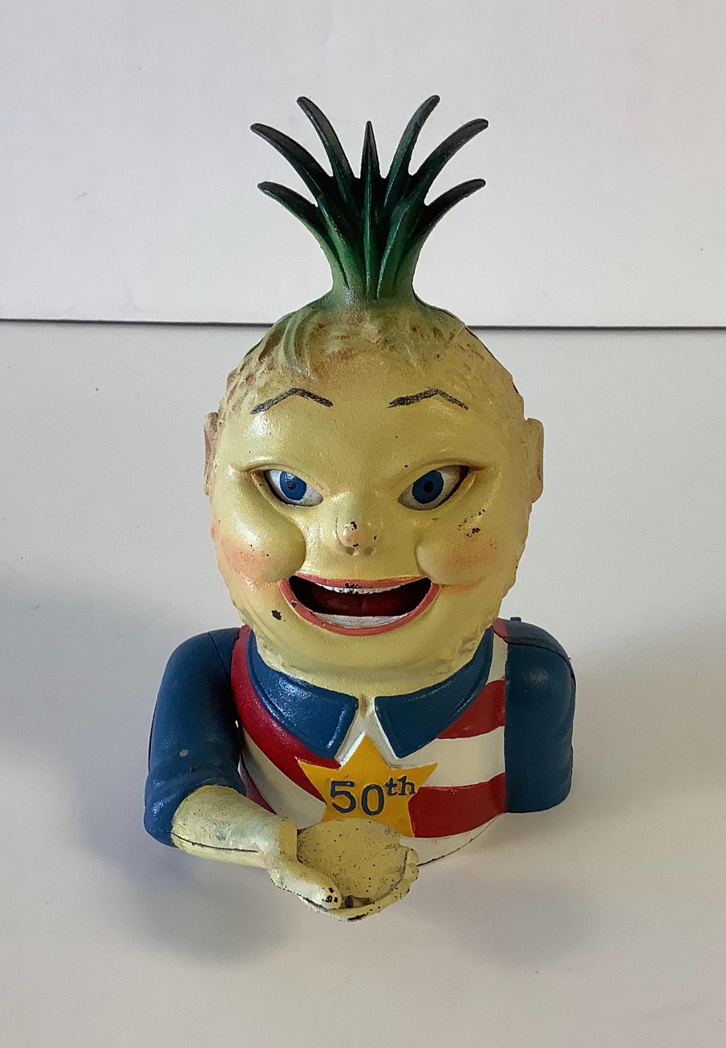 Cast iron mechanical bank 8.5" high: Hawaii 50th state (1 of 1)