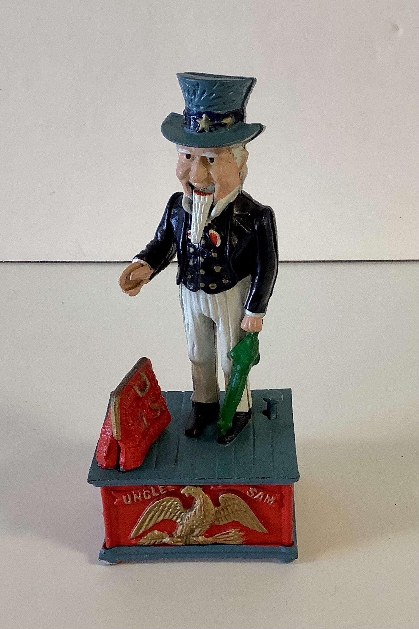 Cast iron mechanical bank 11" tall: Uncle Sam (1 of 1)