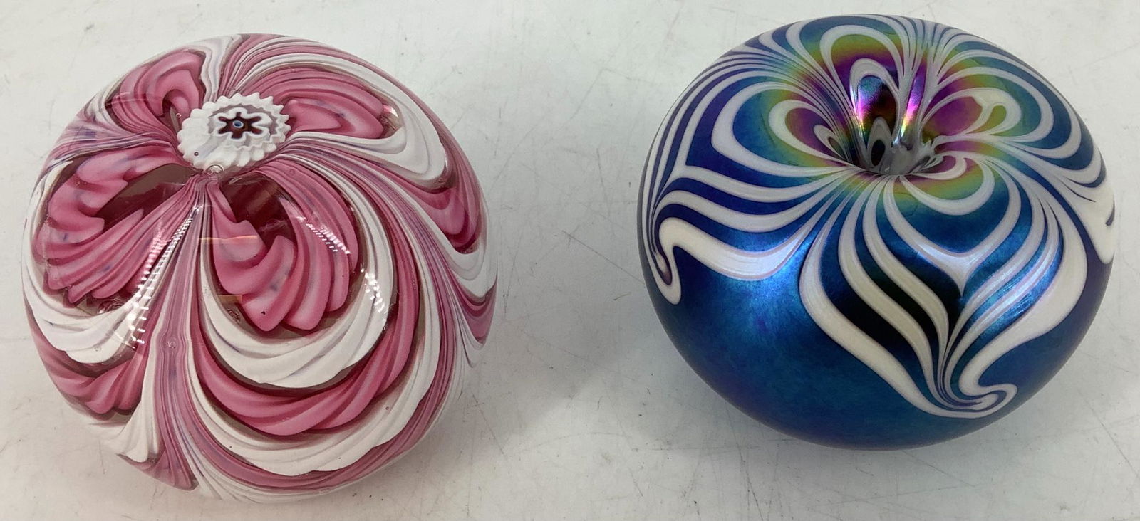 Two paperweights. Blue one is signed Terry Crider, (1 of 1)