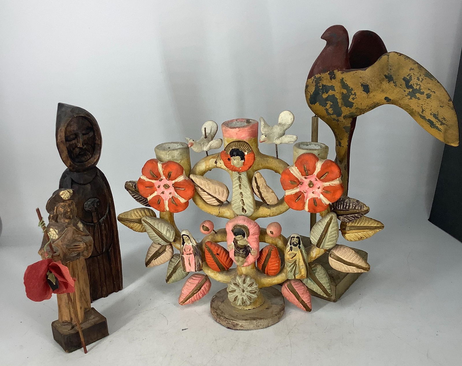 Lot of 4 religious themed figures. Pottery candleholder (1 of 2)