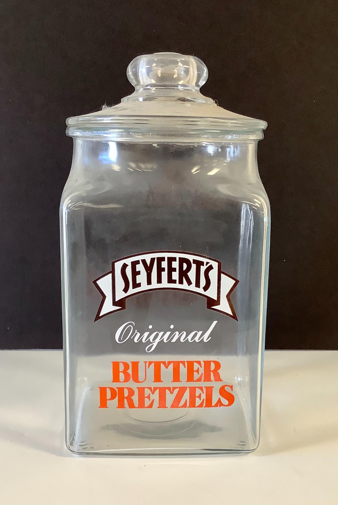 Seyfert's glass store jar with lid. Approx: Seyfert's glass store jar with lid. Approx 6.5"x6.5"x12.5"