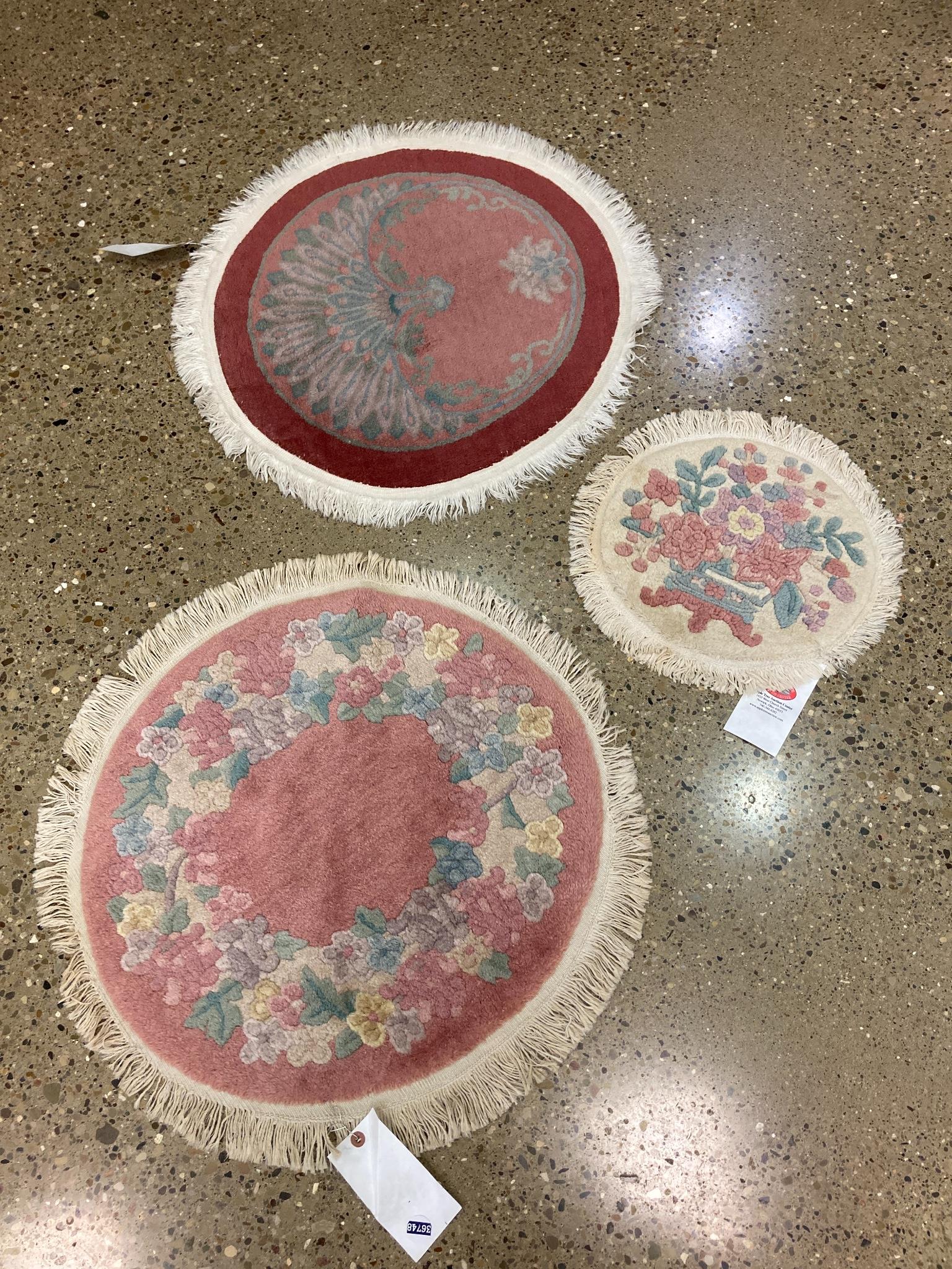 3 round oriental rugs , Chinese 2', 1'1". This lot from (1 of 1)