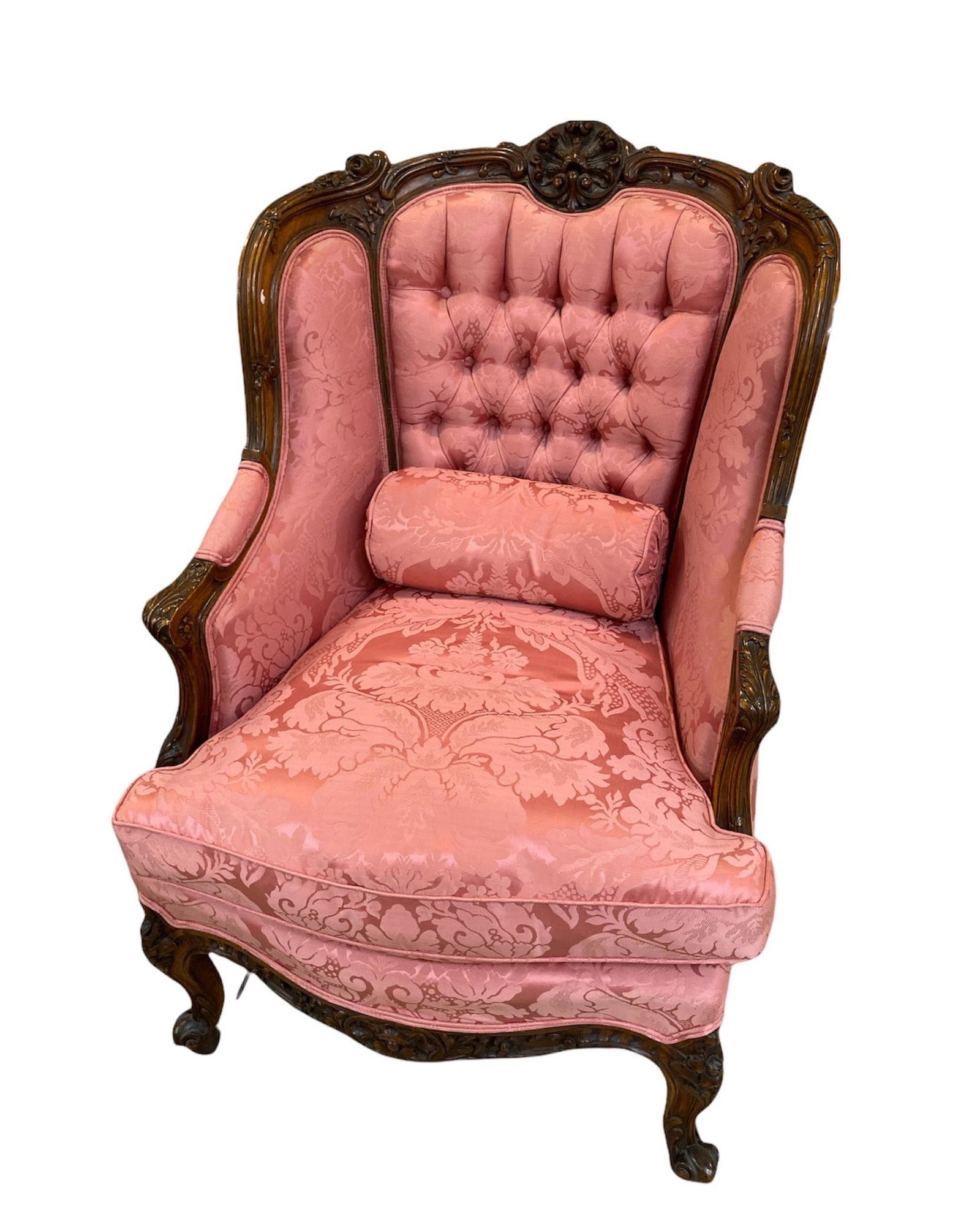 Highly carved French style wing back chair. This lot is (1 of 1)