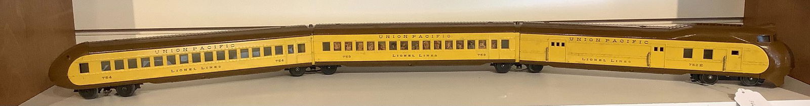 Lionel O gauge pre-war #752 UP diesel, #753 Coach, #754: Lionel O gauge pre-war #752 UP diesel, #753 Coach, #754 observation, yellow and brown.