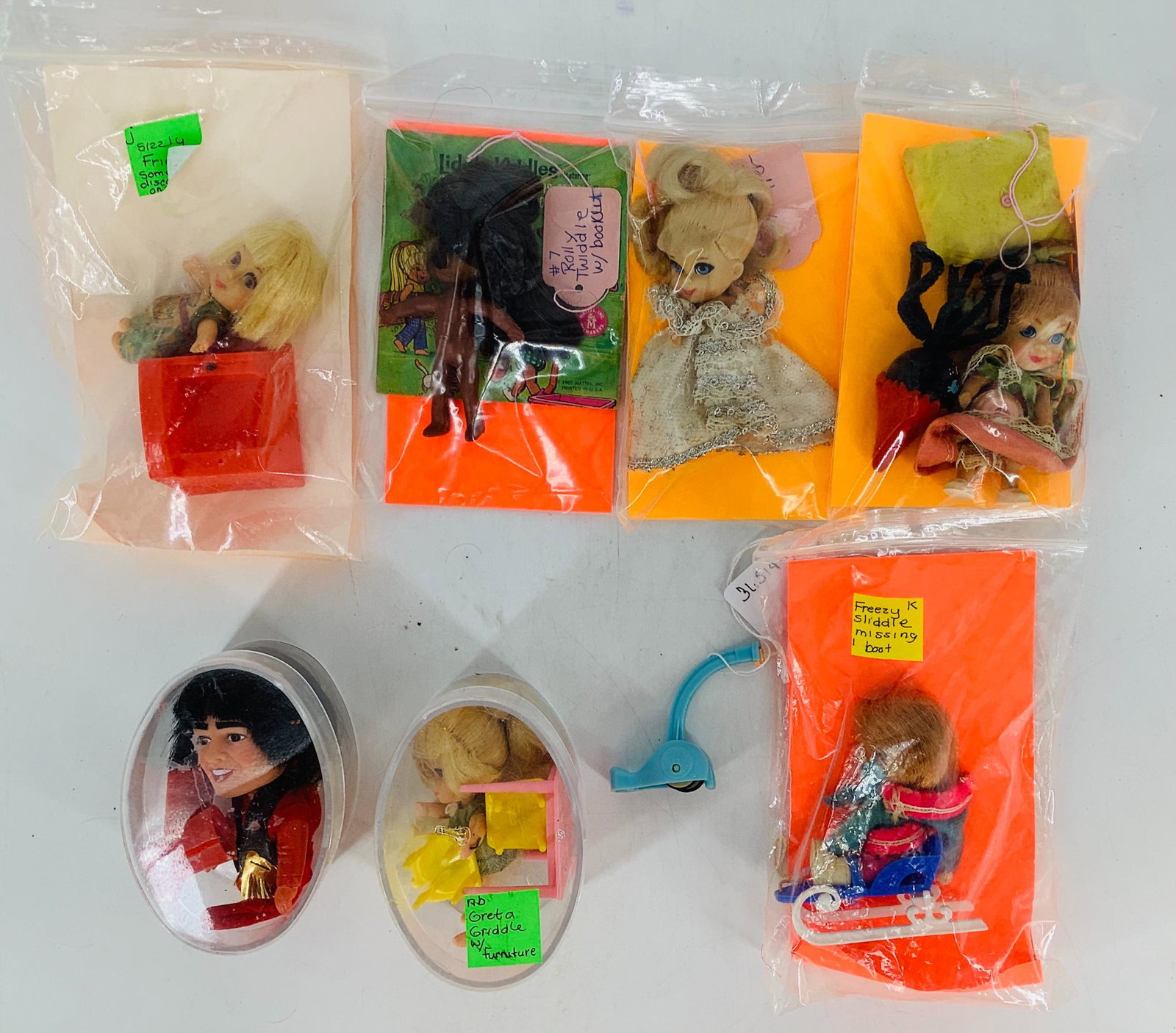 (7) dolls including a Davey Jones & different Little (1 of 1)