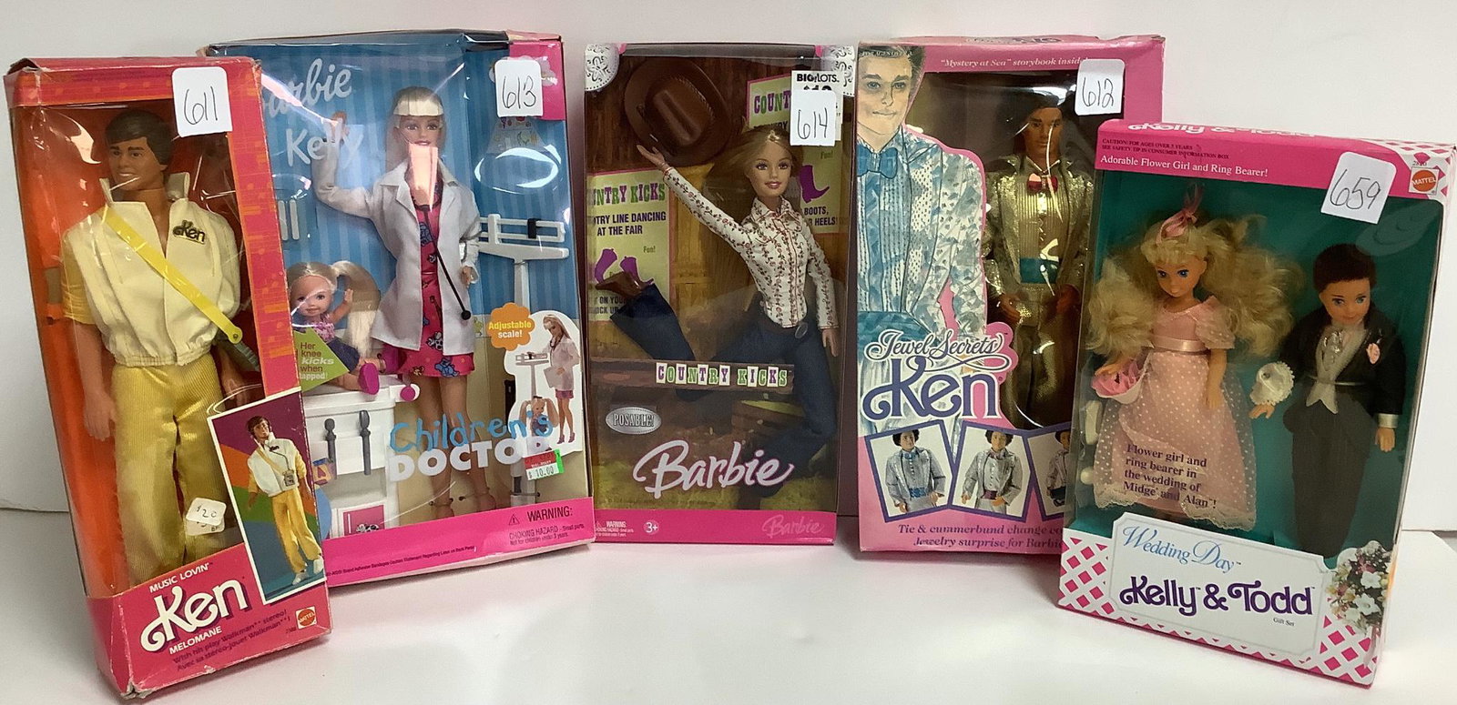 Lot of 5 Barbie's including Music Lovin' Ken, Barbie &: Lot of 5 Barbie's including Music Lovin' Ken, Barbie & Kelly Children's Doctor, Country Kicks Barbie, Jewel Secrets Ken and Wedding Day Kelly & Todd. All boxes have some damage/tape.