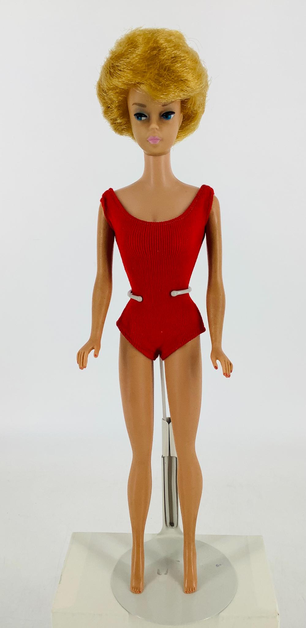 Blond Bubble cut Barbie wearing her red bathing suit. (1 of 5)