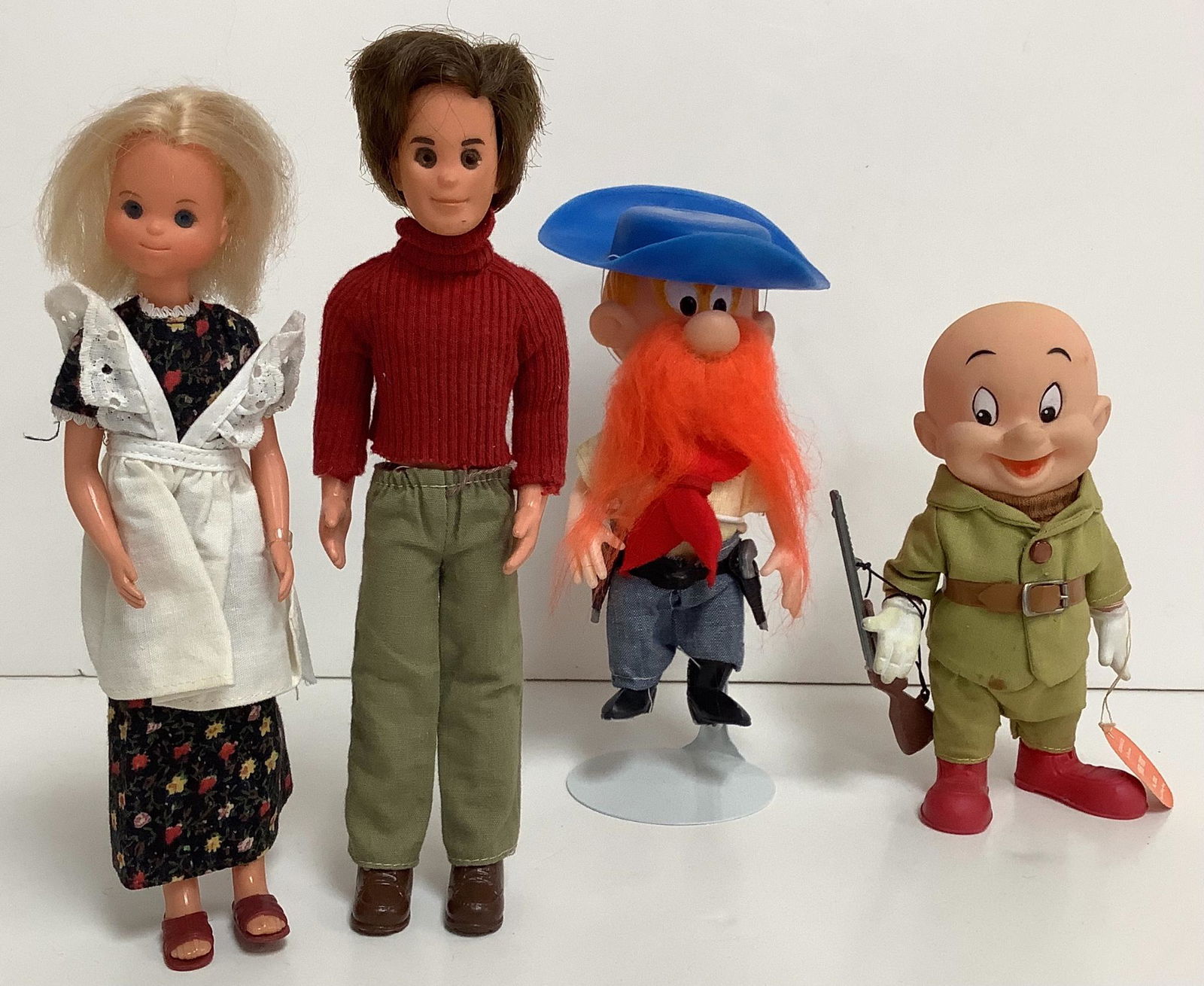 Lot of 4 dolls including Warner Bros.Looney Tunes (1 of 1)