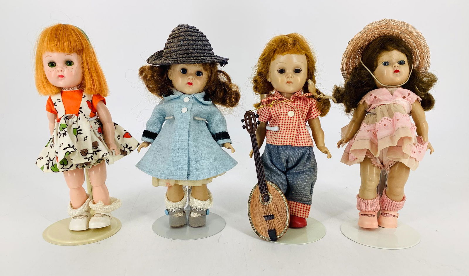 Lot (4) vintage 7 1/2" hard plastic Vogue Ginny dolls. (1 of 1)