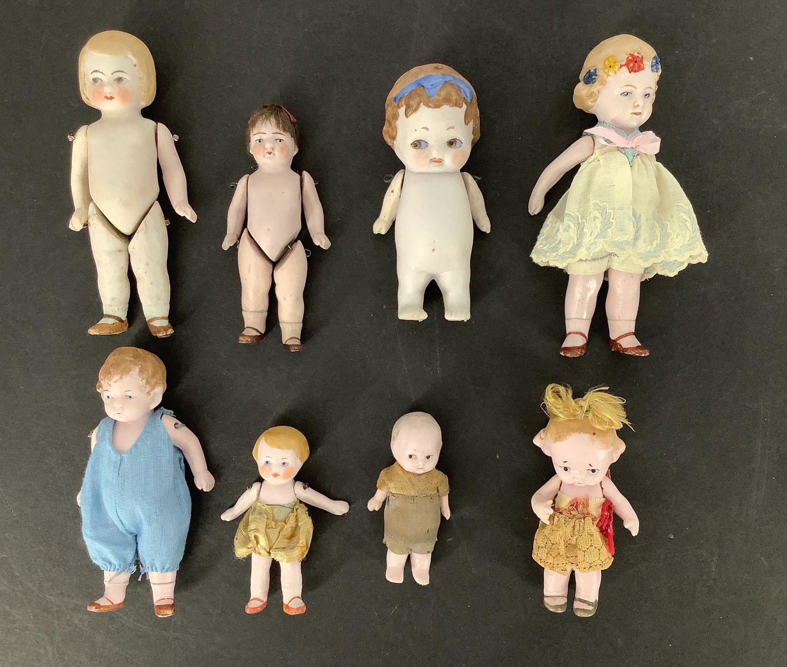 Lot (8) small all-bisque dolls. 2 1/2" - 4 1/2" with (1 of 1)